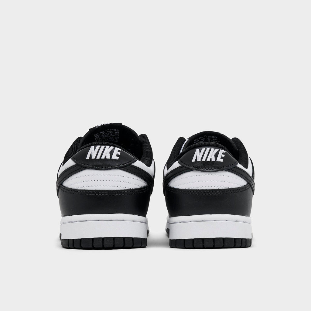Men's Nike Dunk Low Retro Casual Shoes - Black/White/Black - view 4