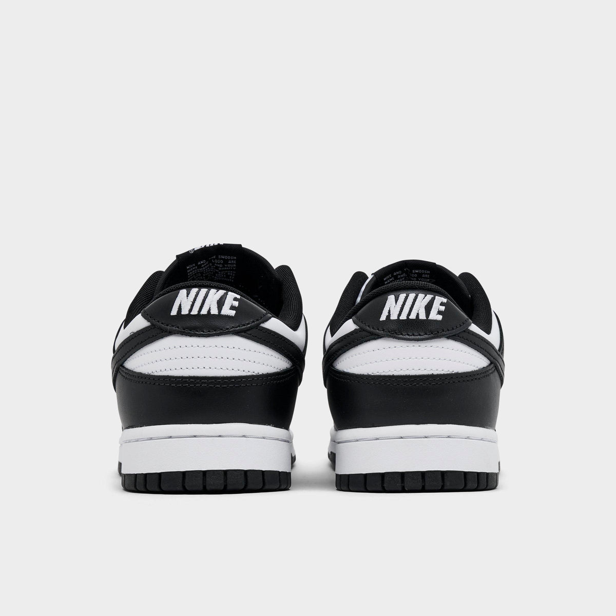 Men's Nike Dunk Low Retro Casual Shoes - Black/White/Black - view 4
