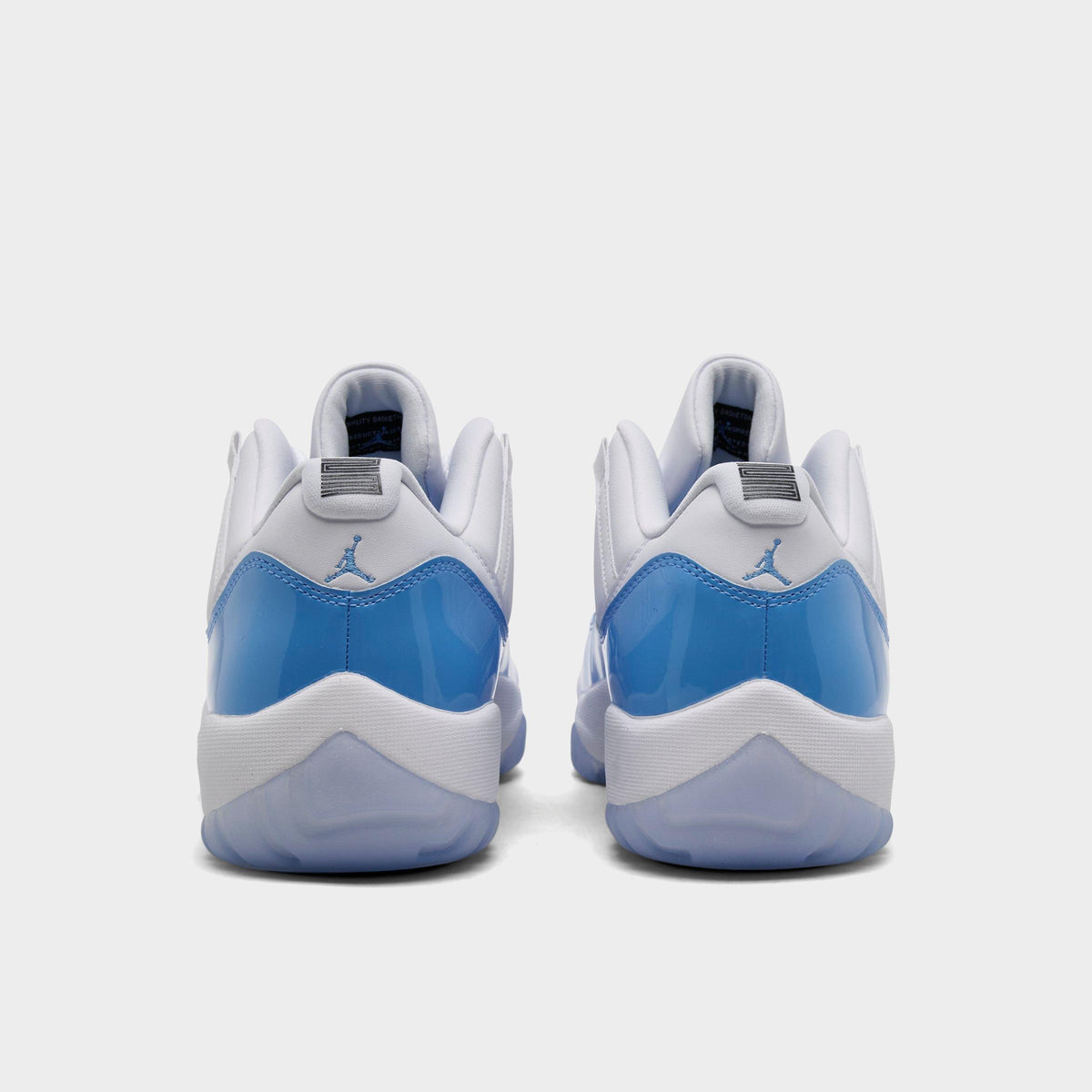 Men's Air Jordan Retro 11 Low Basketball Shoes - White/University Blue/Black - view 4