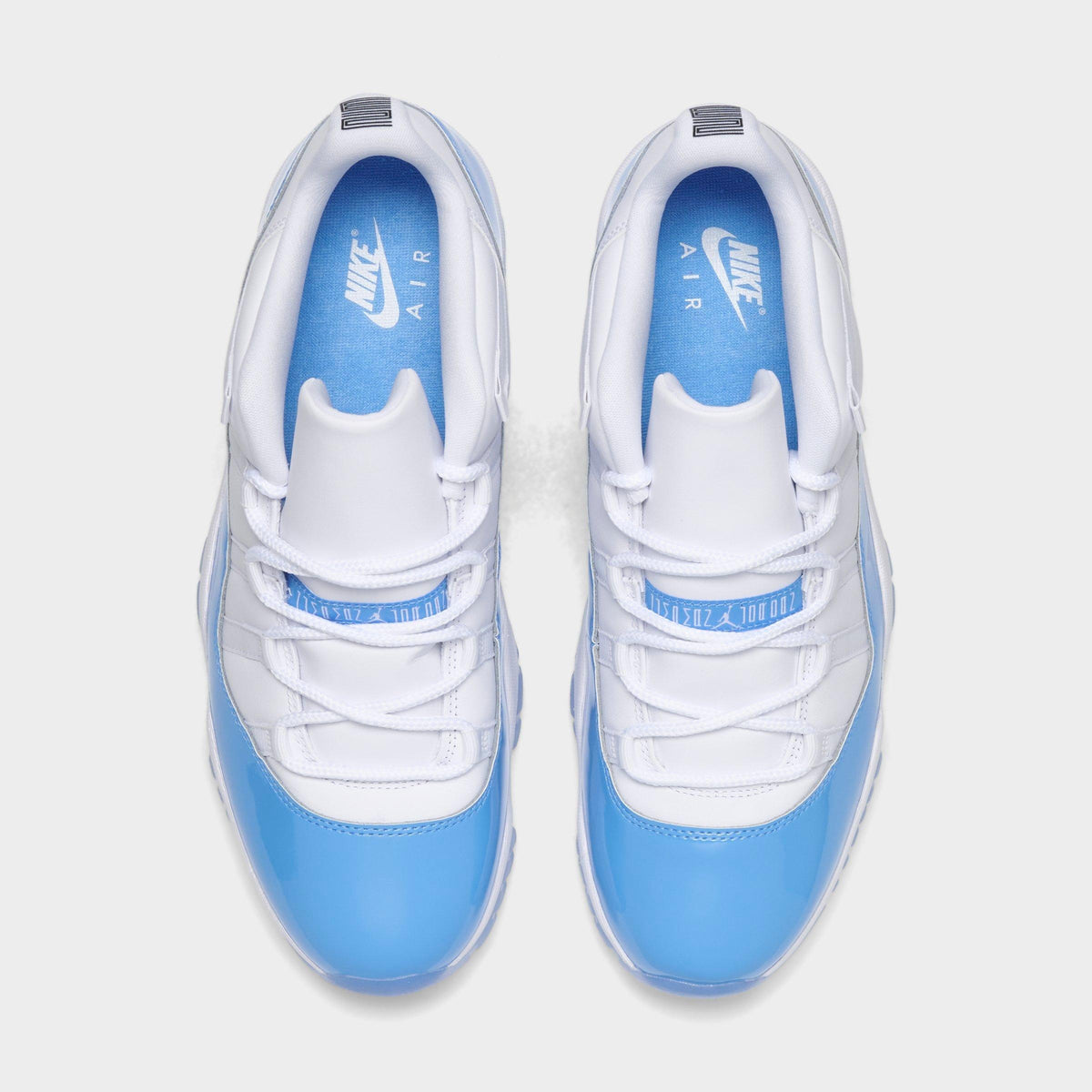 Men's Air Jordan Retro 11 Low Basketball Shoes - White/University Blue/Black - view 5