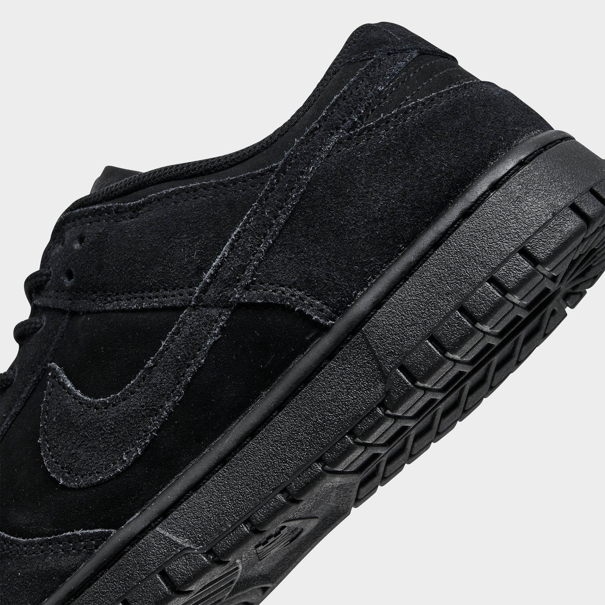 Men's Nike Dunk Low Retro SE Suede Casual Shoes - Black/Black/Black - view 3